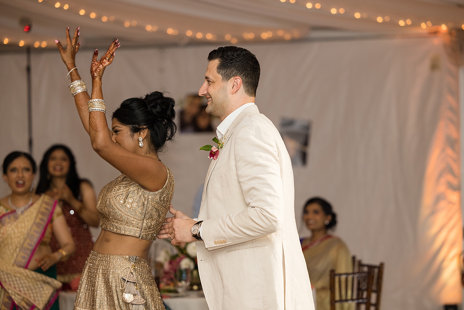 bride and groom enter reception dance floor