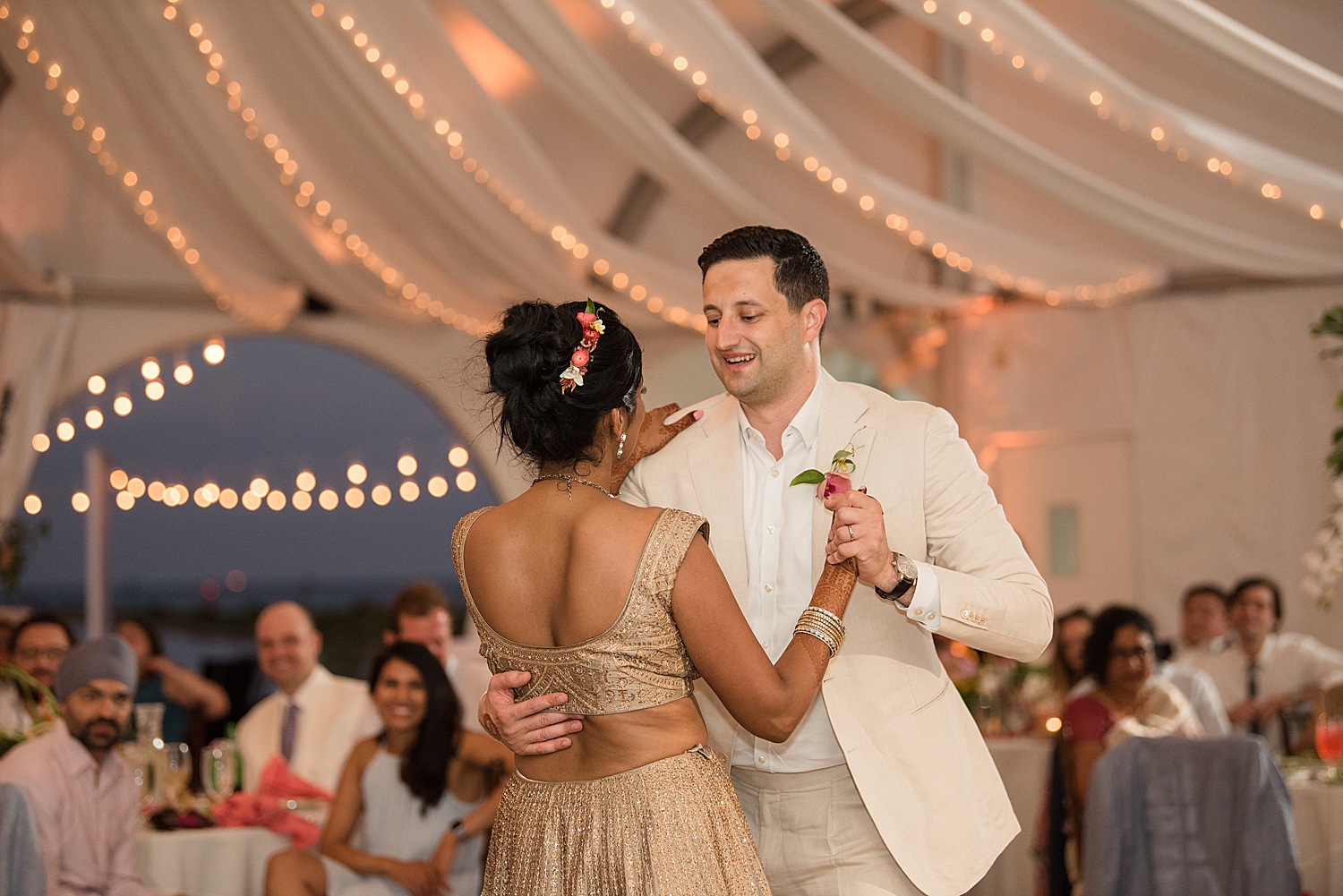 bride and groom first dance tent