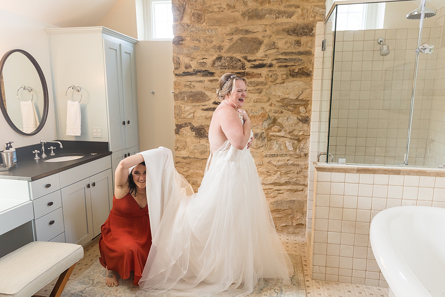 bride getting ready in bathroom