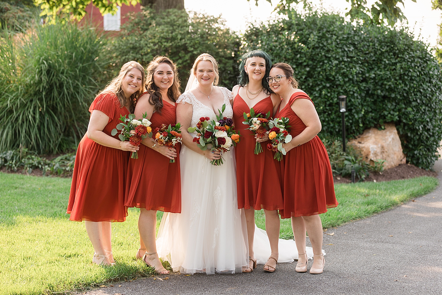 bride and bridesmaids in orange