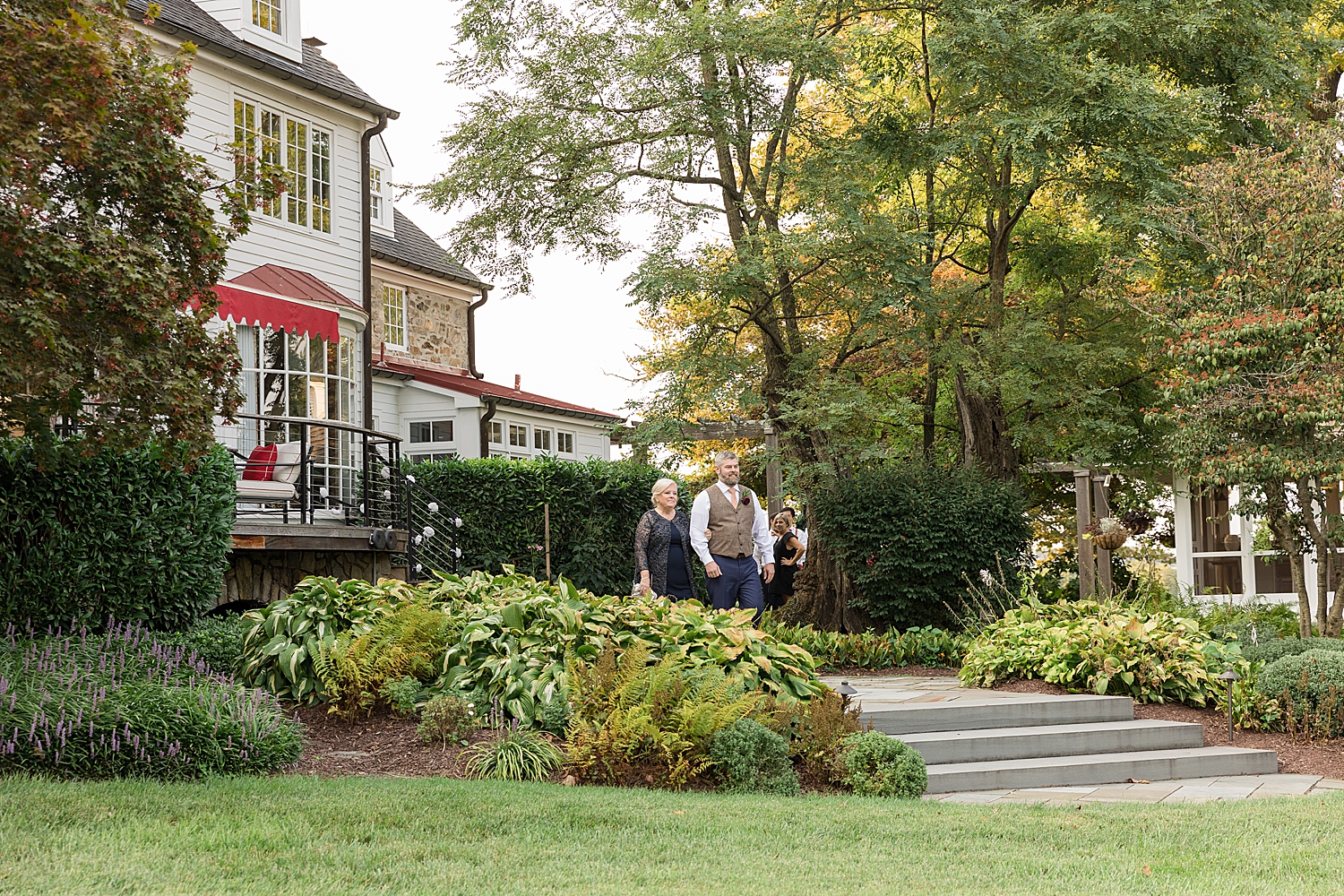 groom entering ceremony with parents tusculum farm