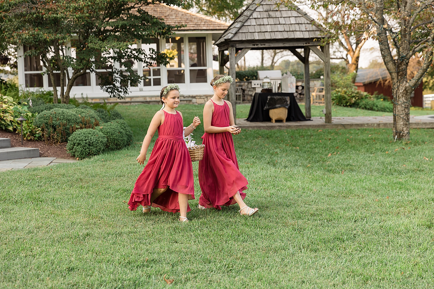 flower girls walking into ceremony