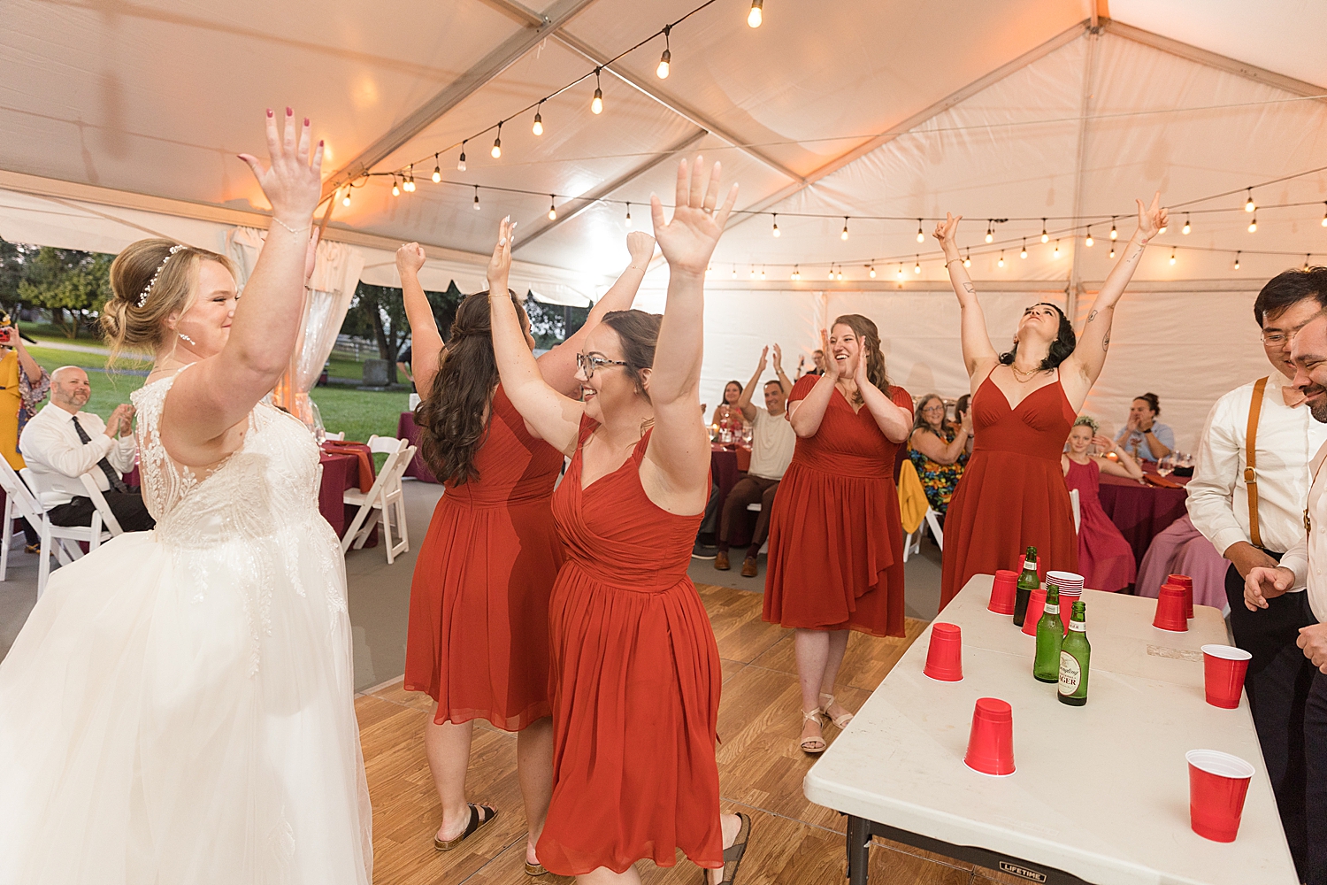 bride and bridesmaids cheering