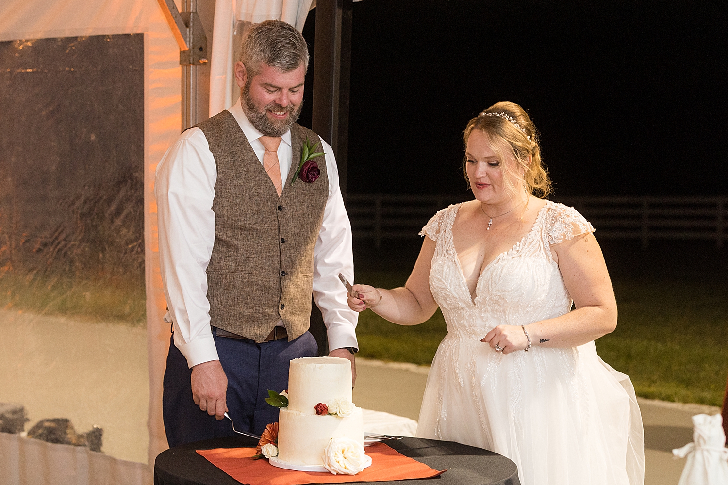 bride and groom cake cutting