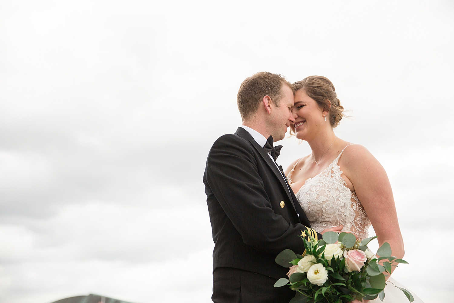 bride and groom on annapolis dock