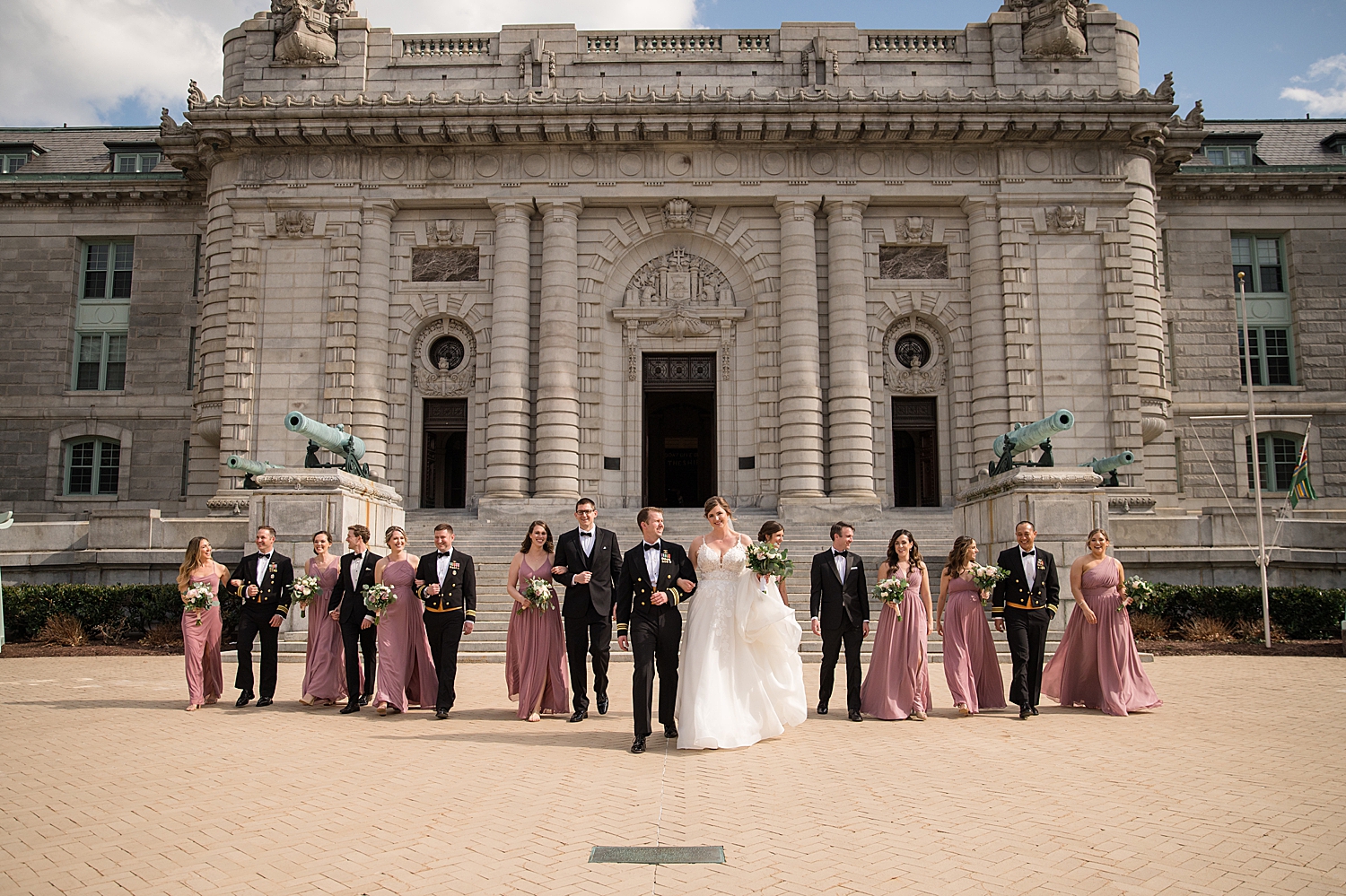 full wedding party in front of bancroft hall