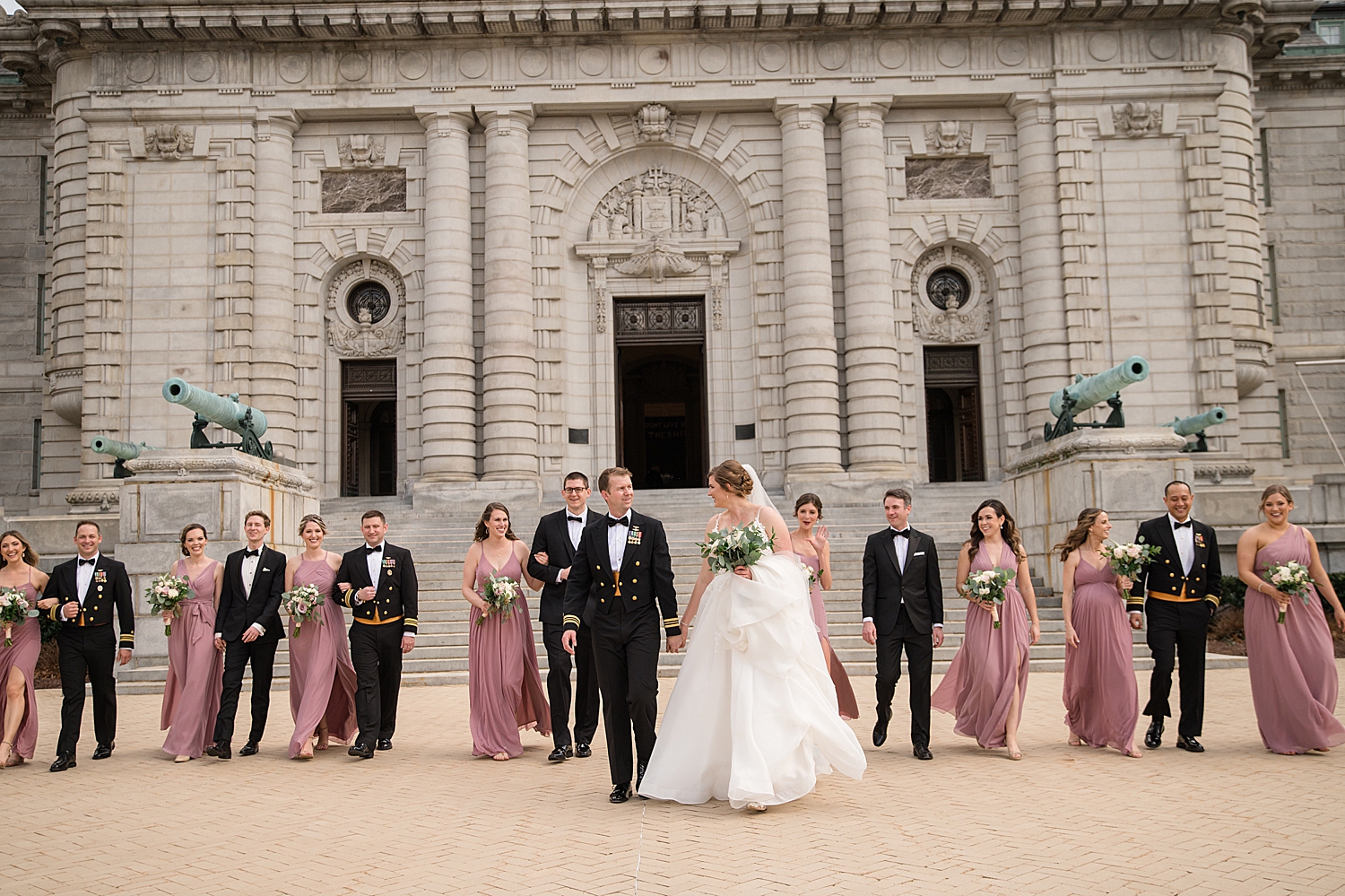 full wedding party in front of bancroft hall