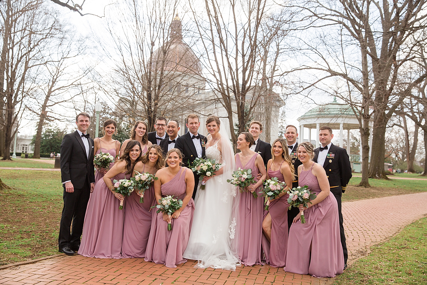 full wedding party outside of usna chapel