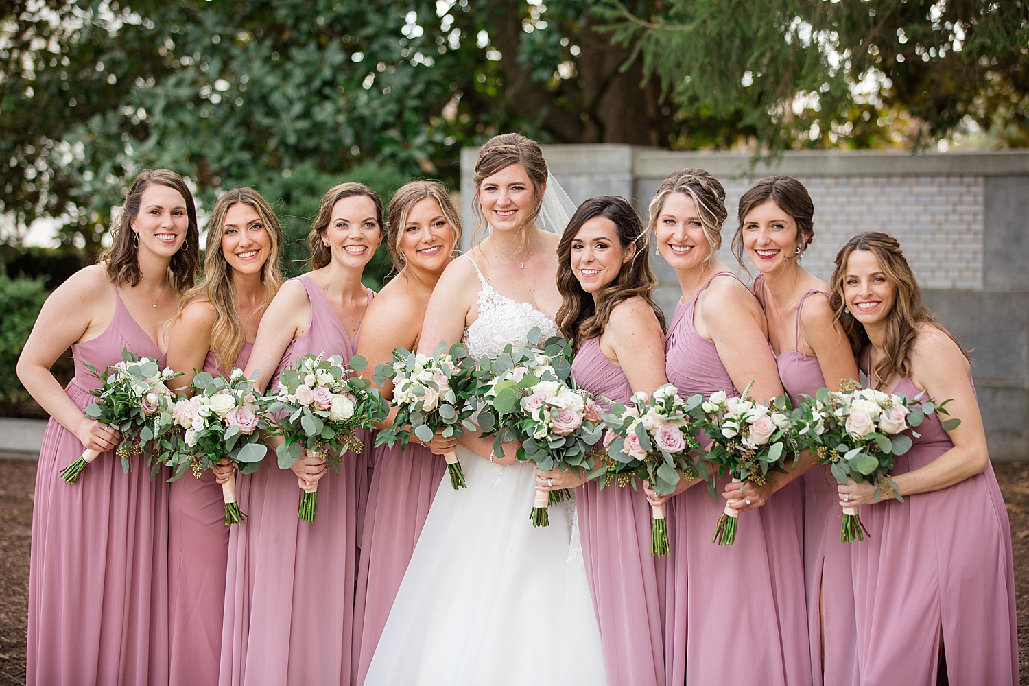 bride and bridesmaids in usna garden