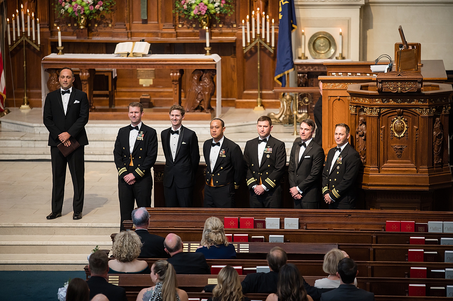 groom waiting for bride inside usna chapel