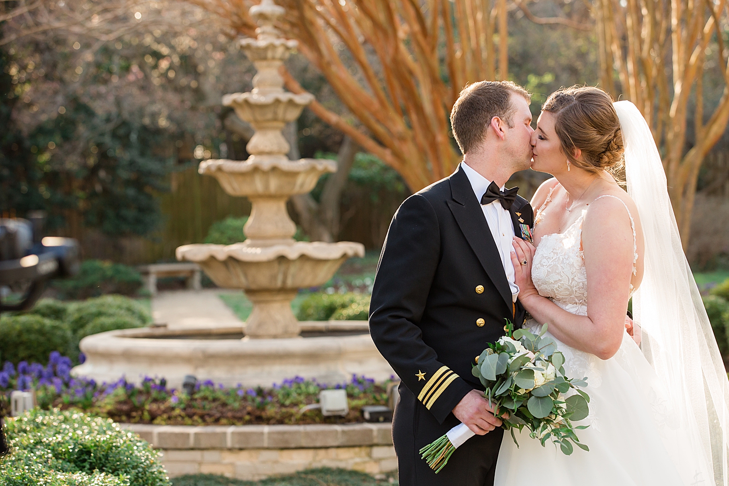 couple portrait in usna garden fountain