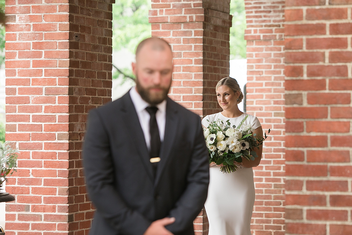 groom and bride first look at tidewater inn