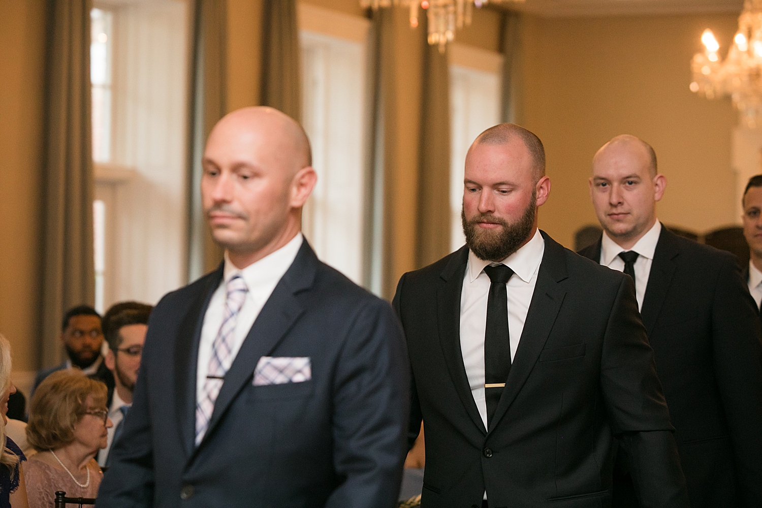 groomsmen enter ceremony