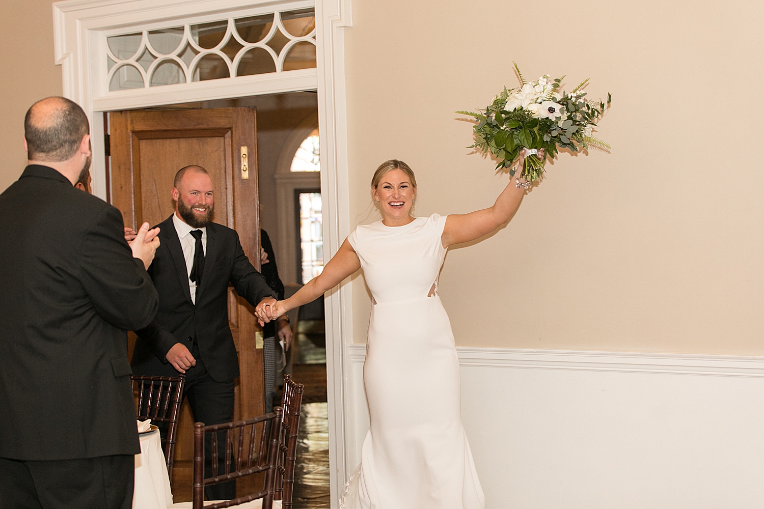 bride and groom enter reception