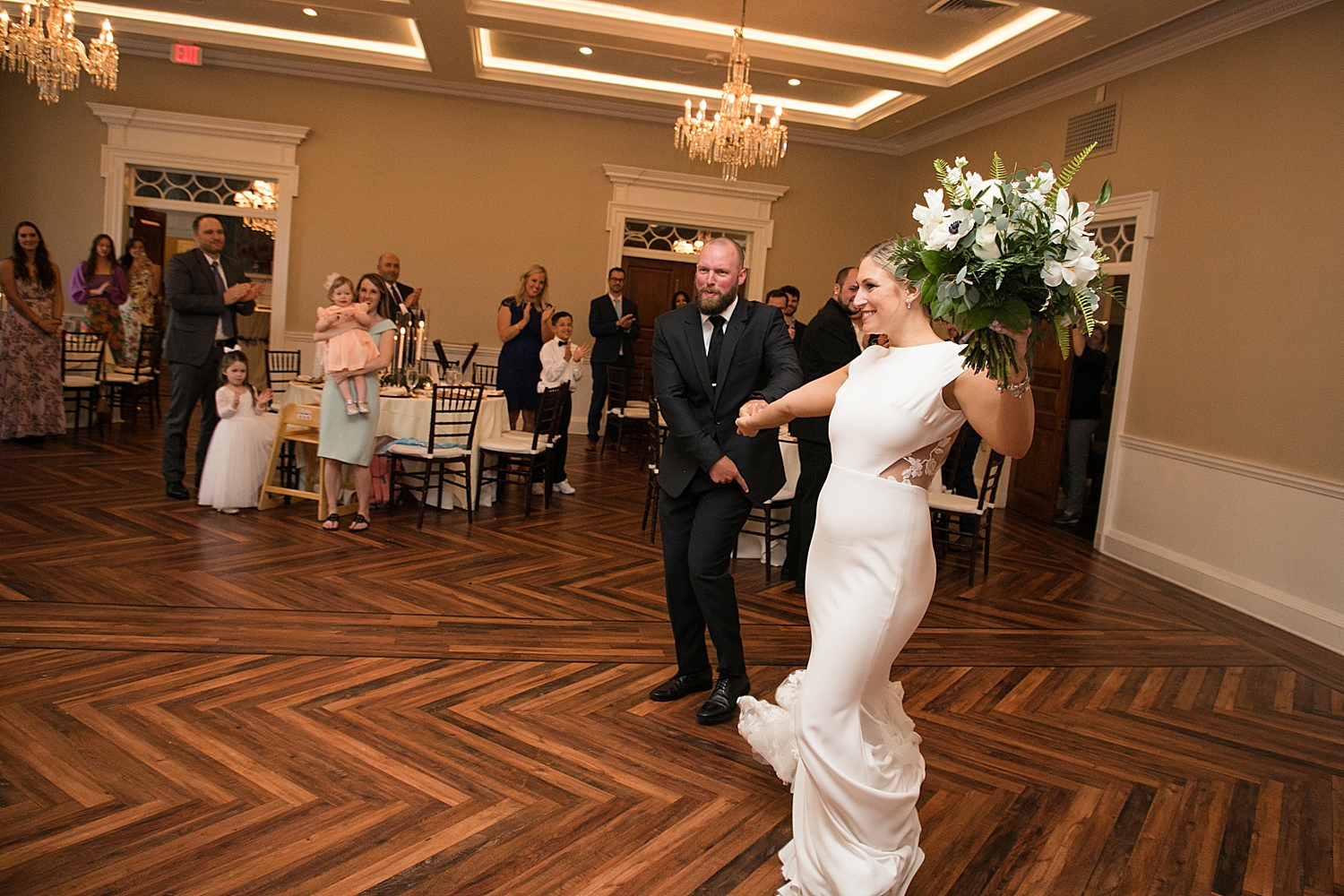 bride and groom enter reception