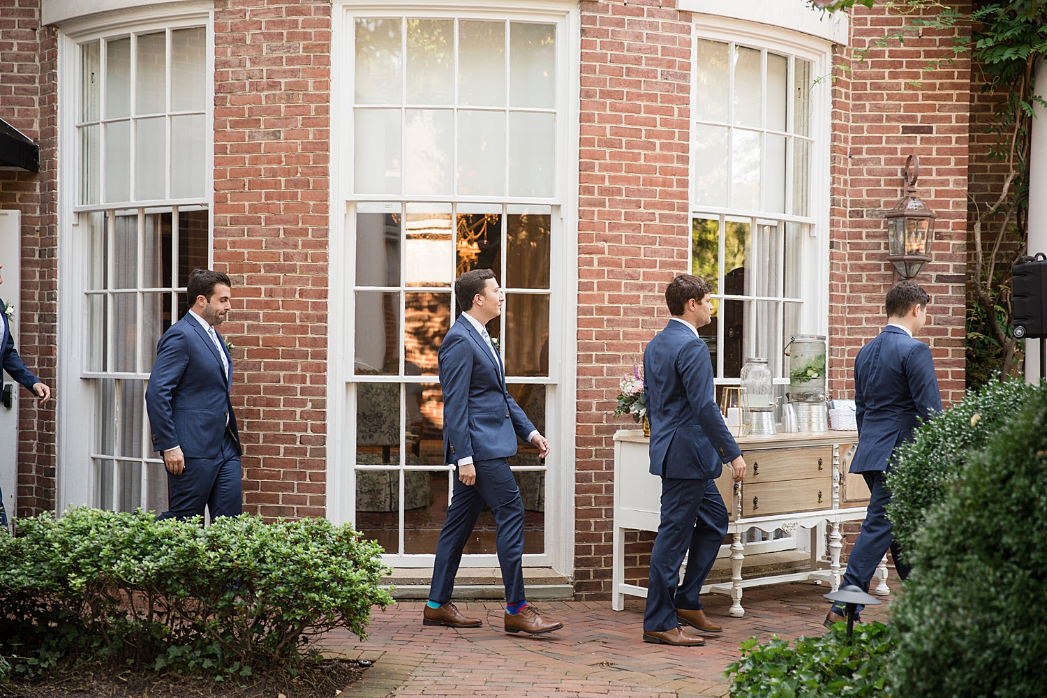 groom and groomsmen enter ceremony