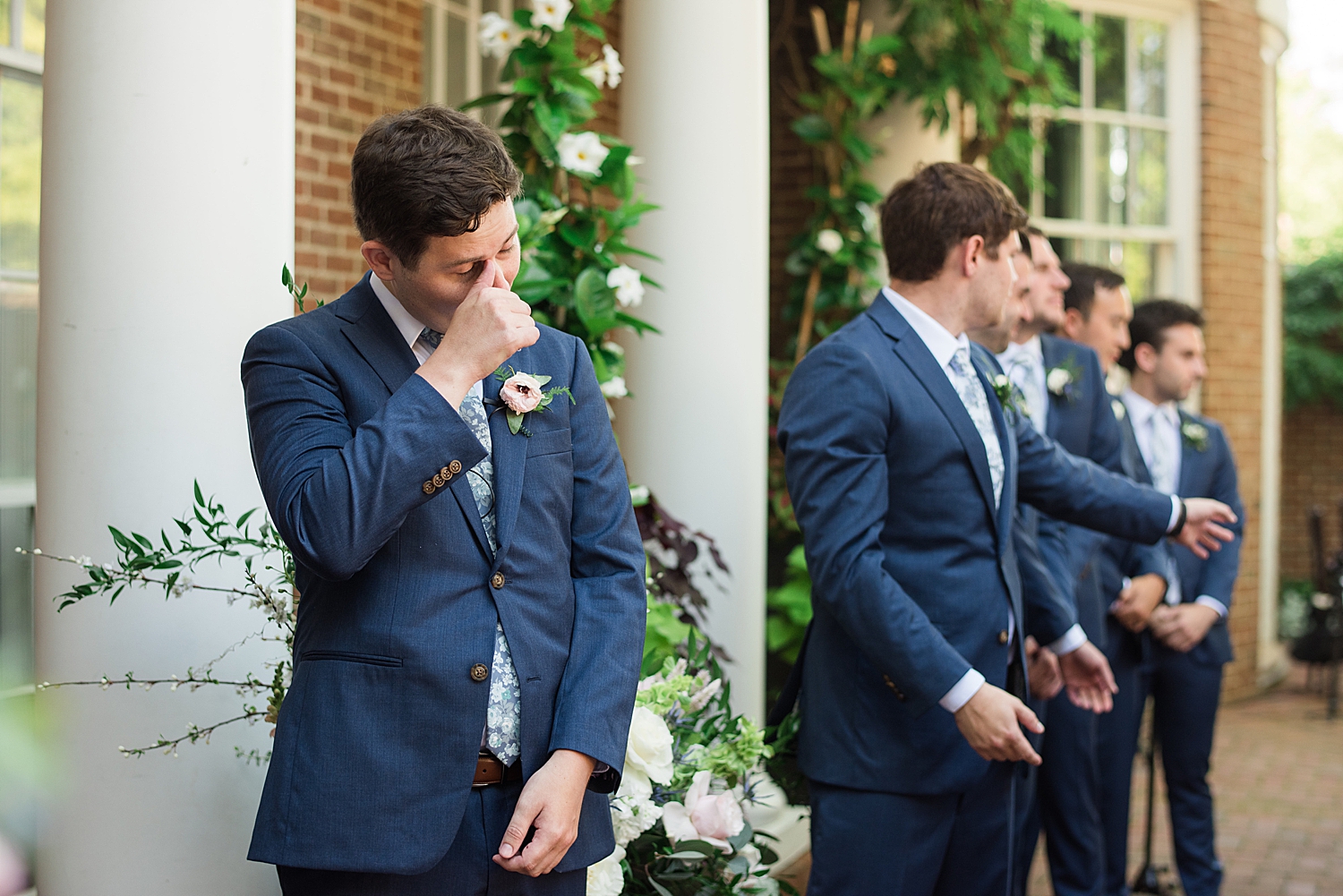 groom cries while seeing bride enter ceremony