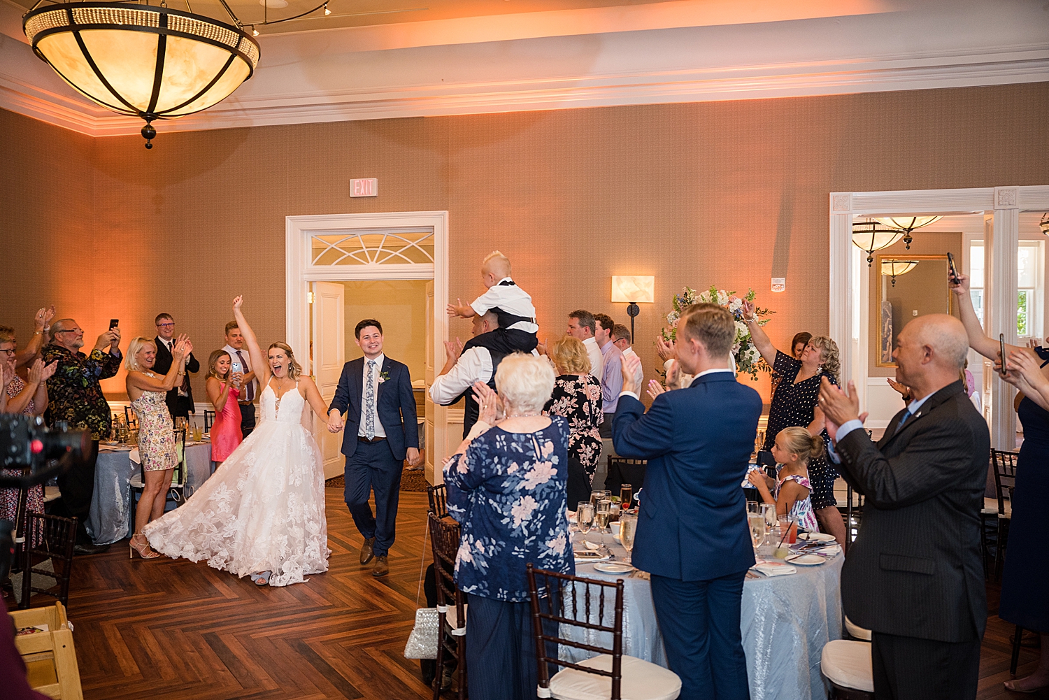 bride and groom enter reception