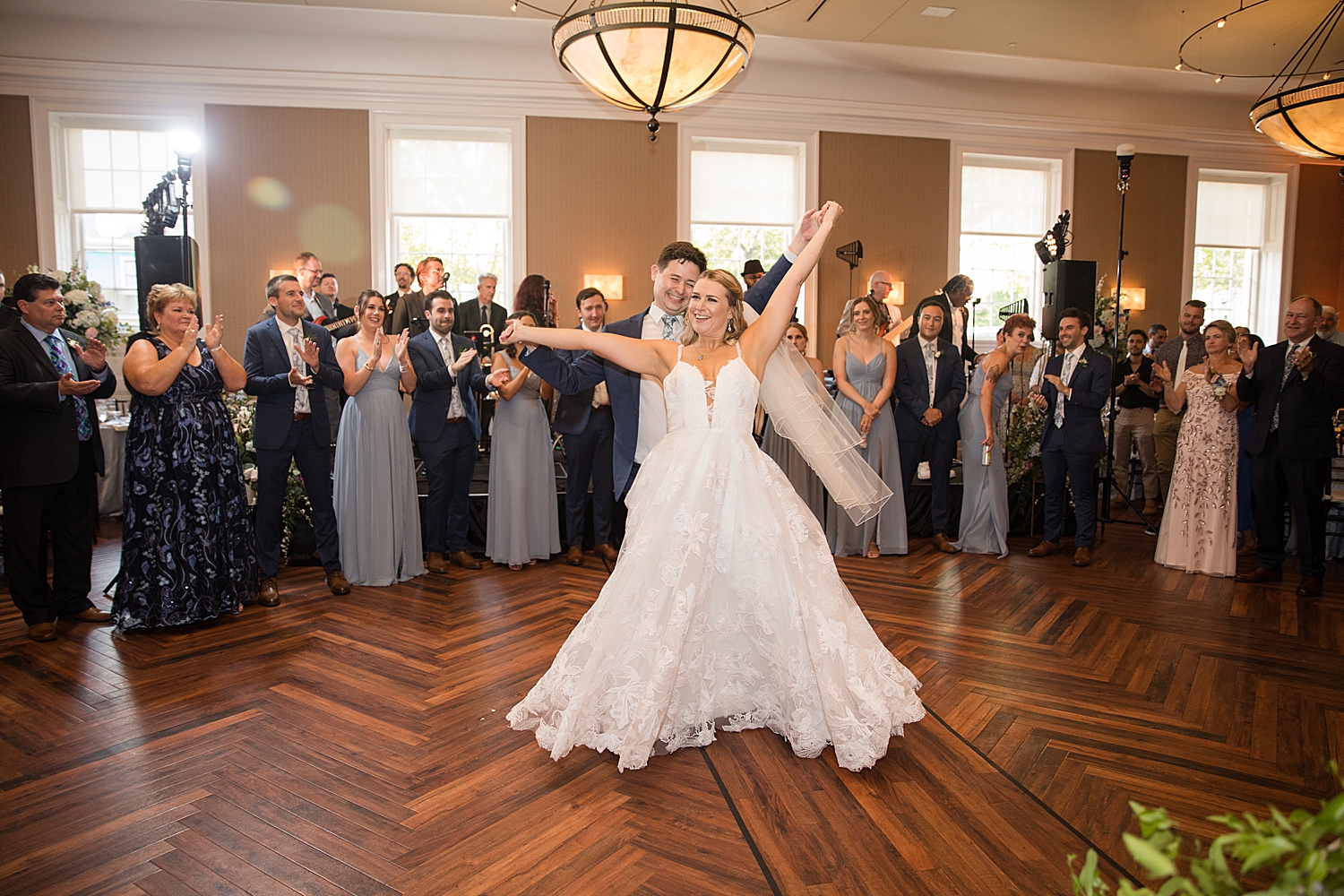 bride and groom enter reception