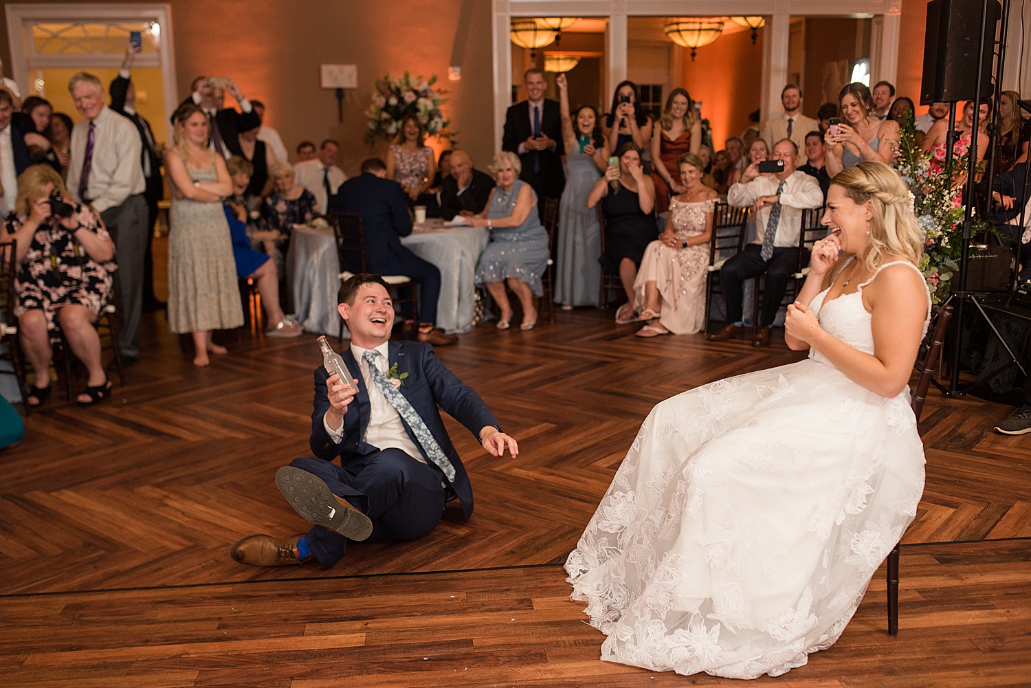 groom removes garter