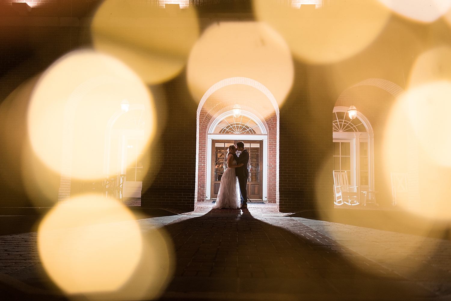 bride and groom silhouette with bokeh