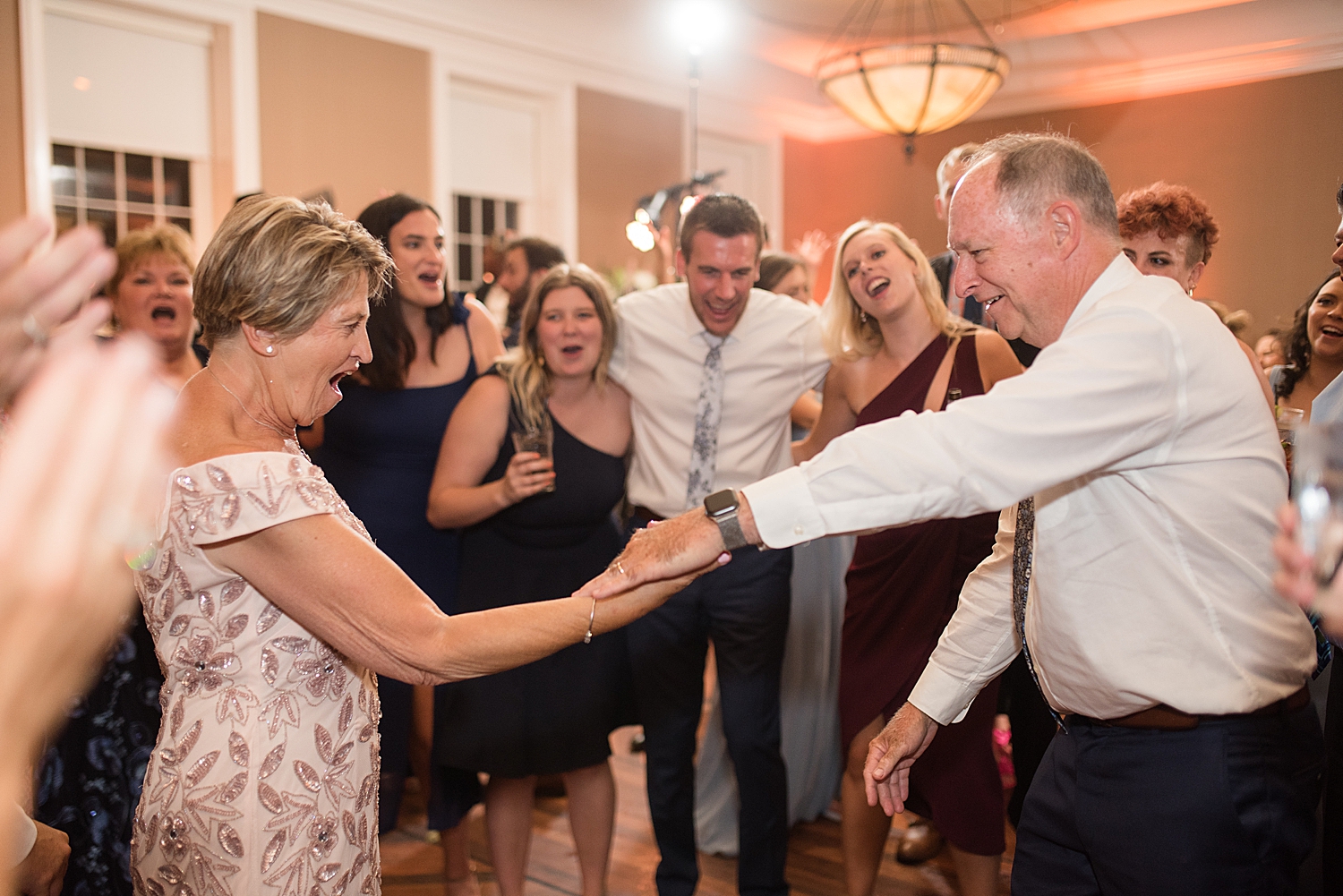 candid wedding dancing