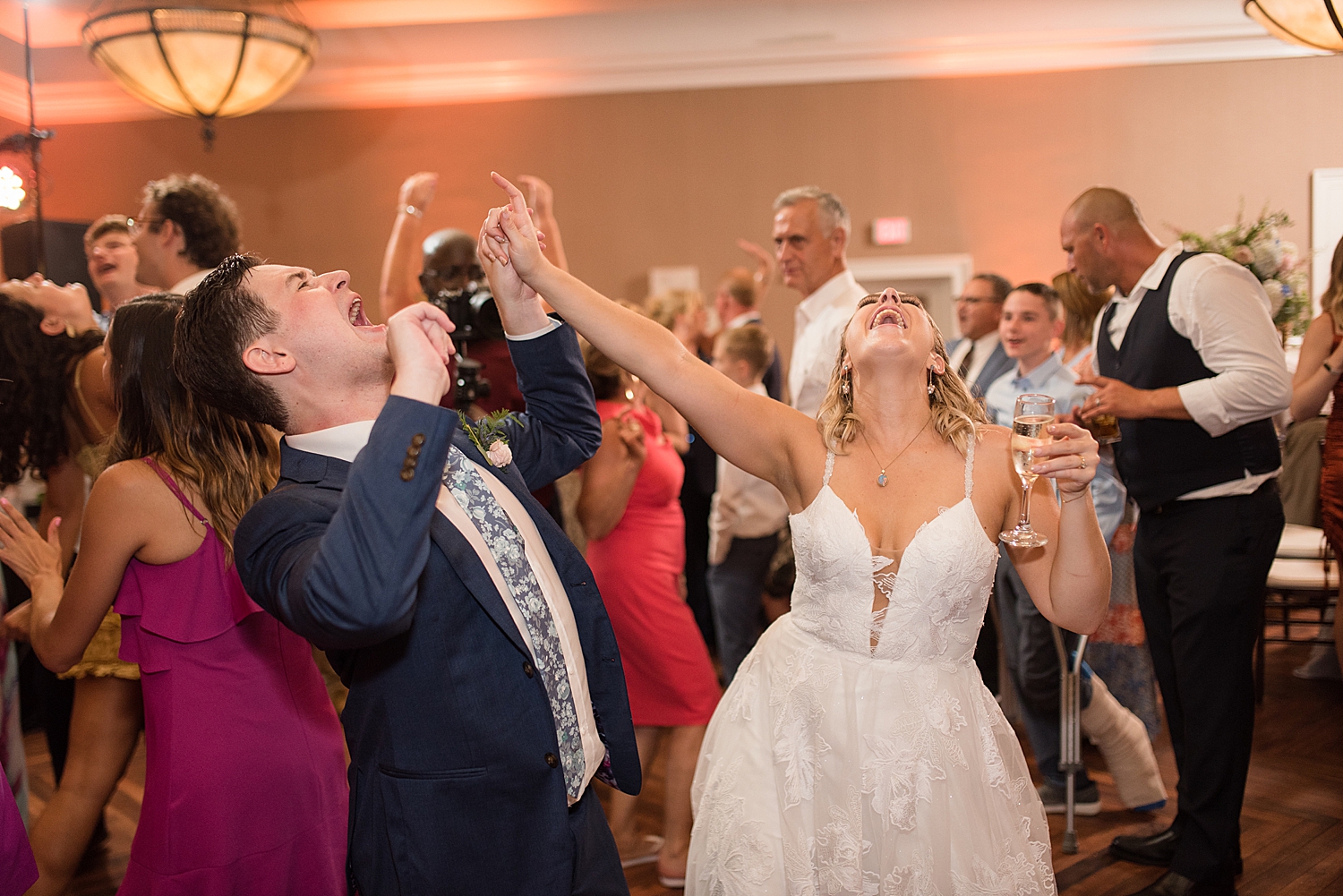 candid wedding dancing