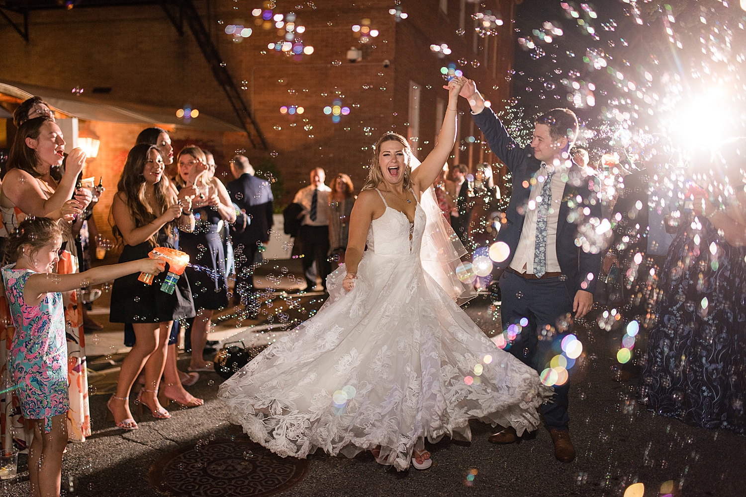 bride and groom celebratory bubble exit