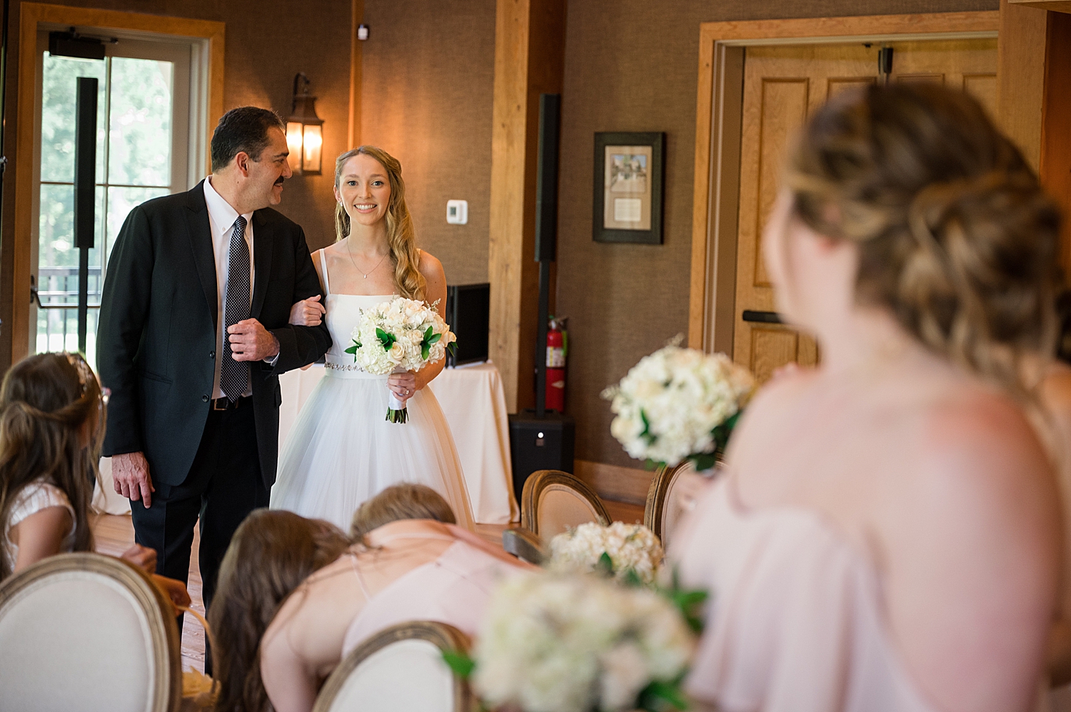 bride getting ready to walk down aisle with dad