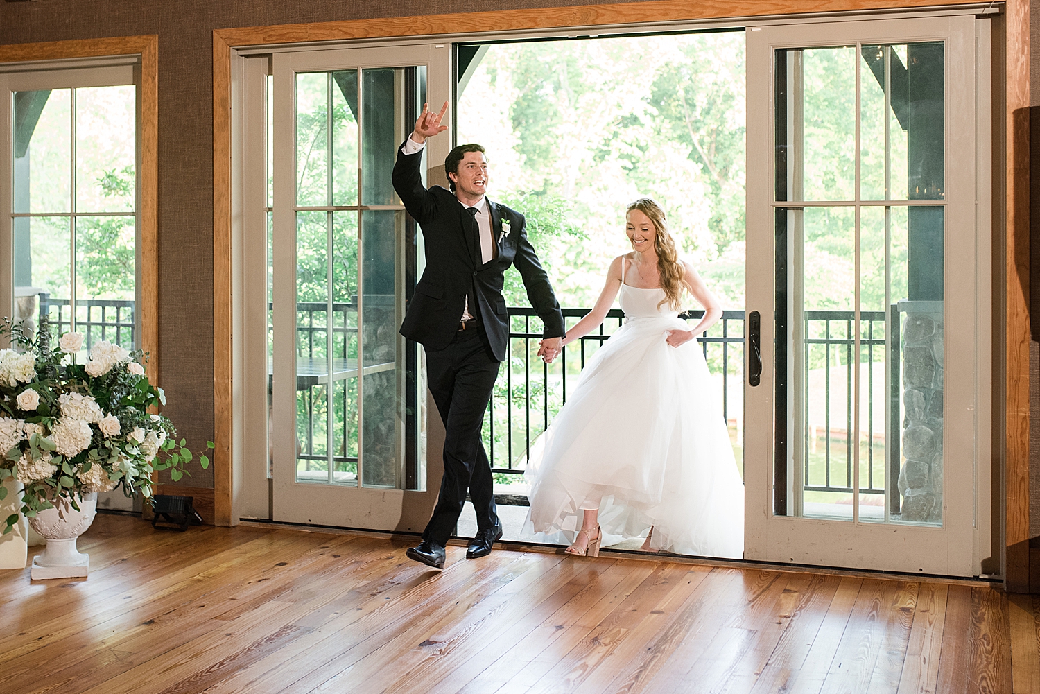 bride and groom enter reception