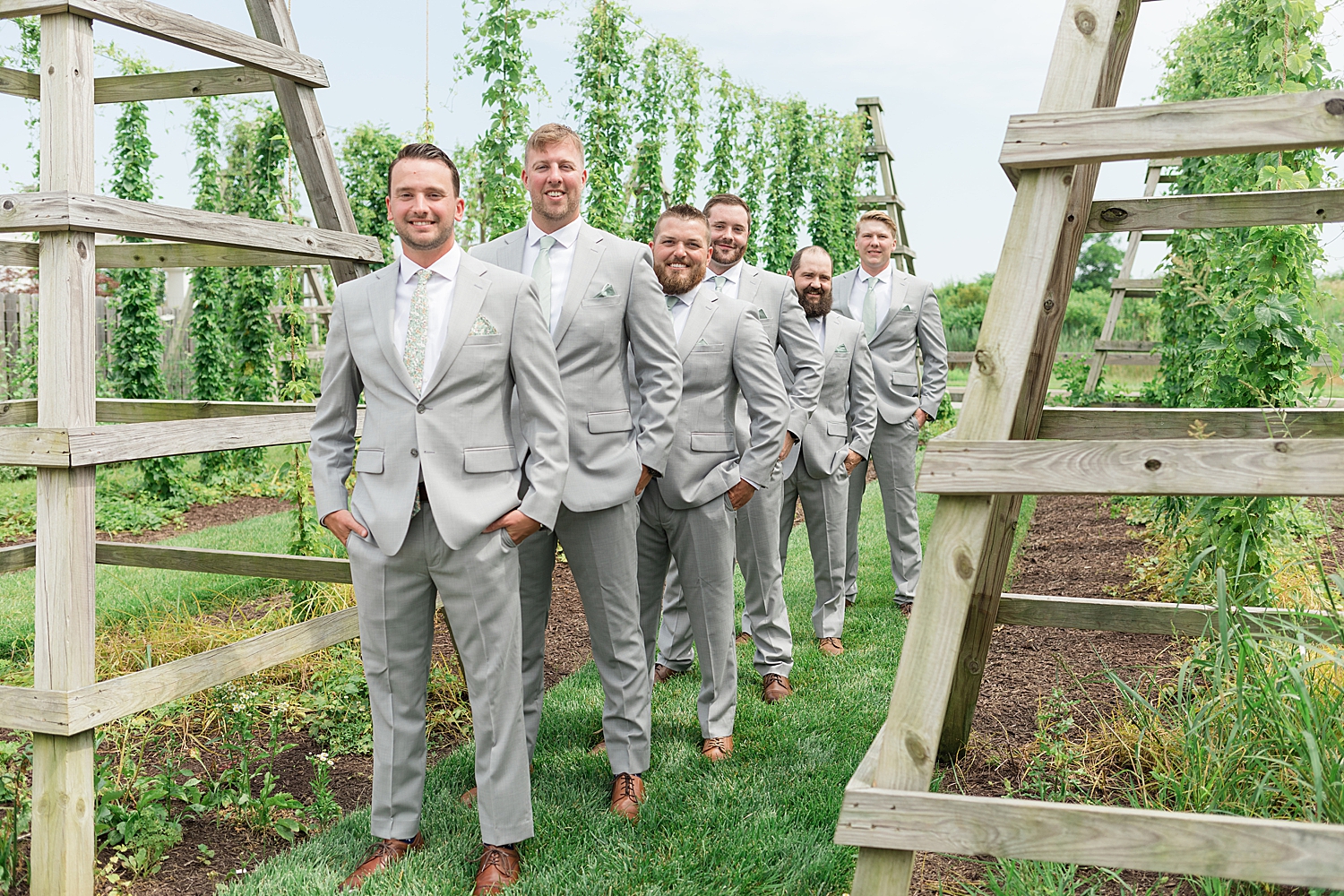 groom and groomsmen in garden