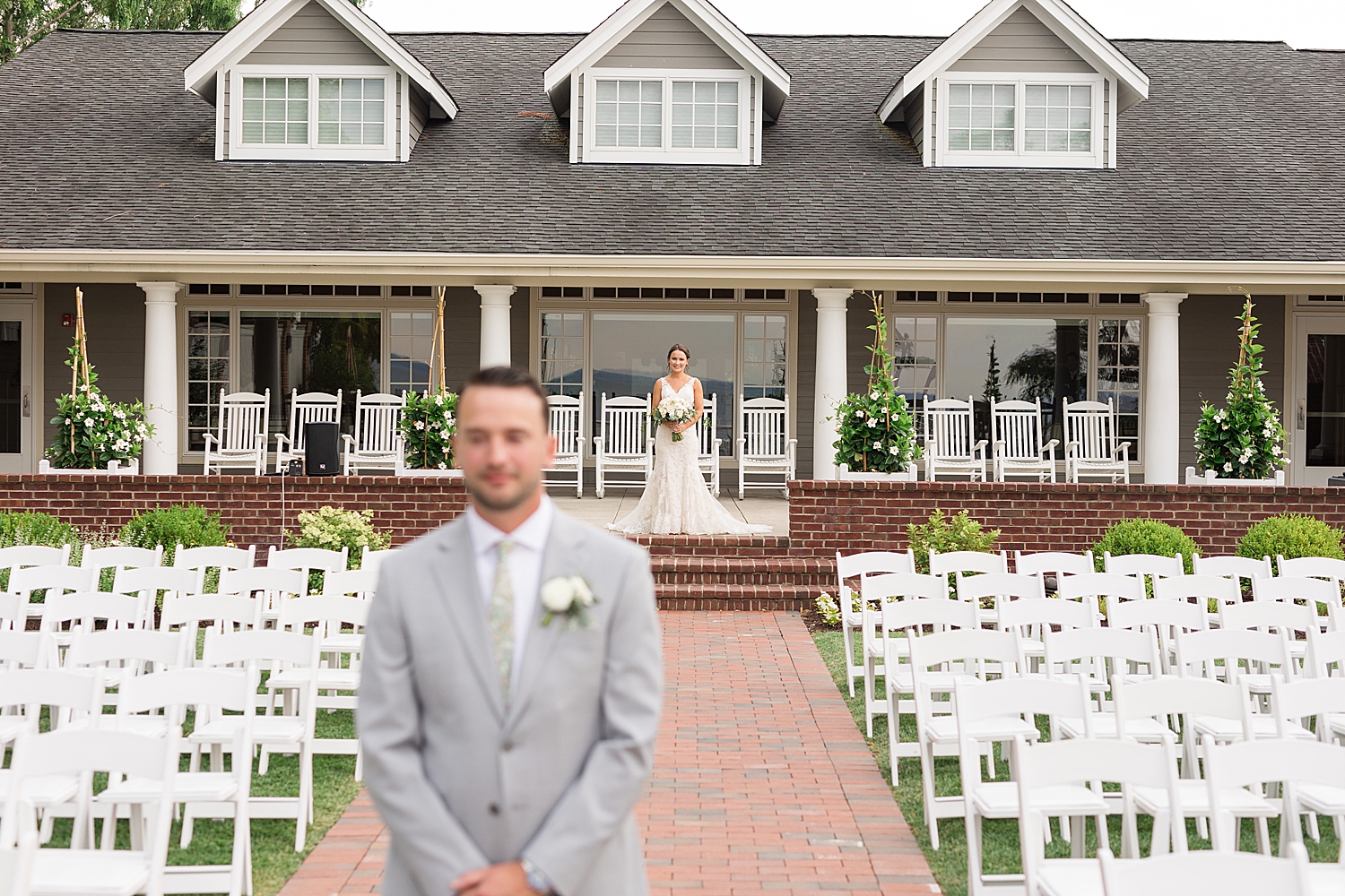 groom waiting for first look with bride