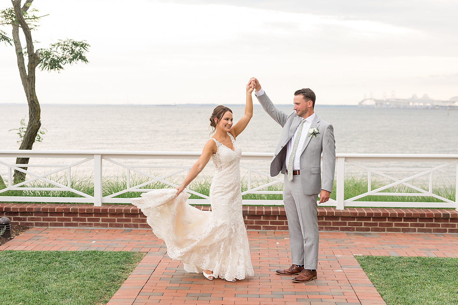 bride and groom portrait dress twirl