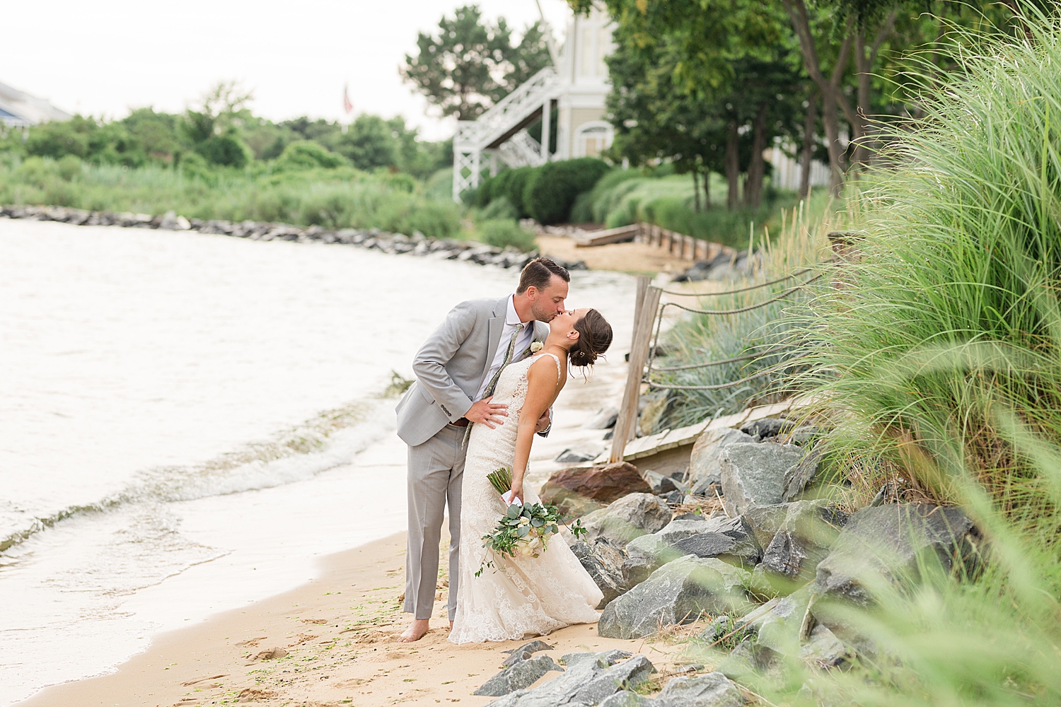 waterfront beach couple portrait kiss