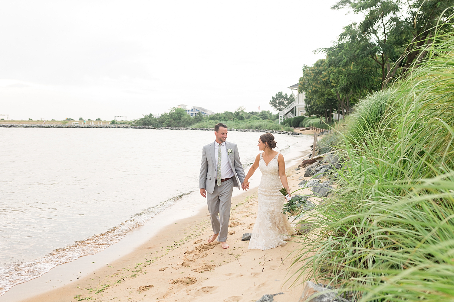 waterfront beach couple portrait walking