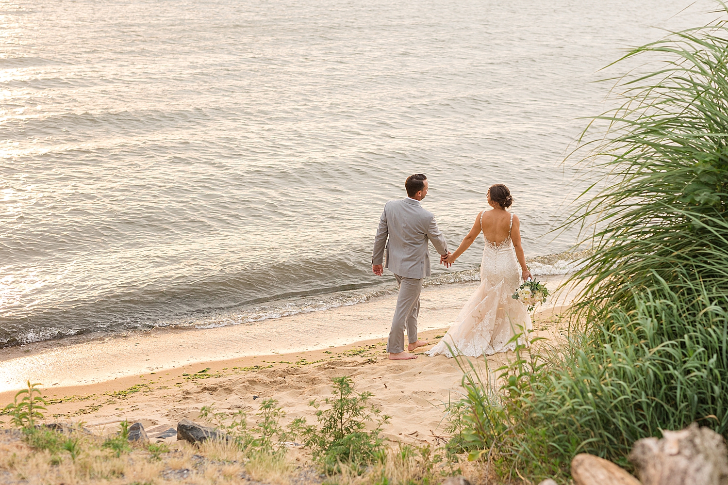 waterfront beach couple portrait sunset walking