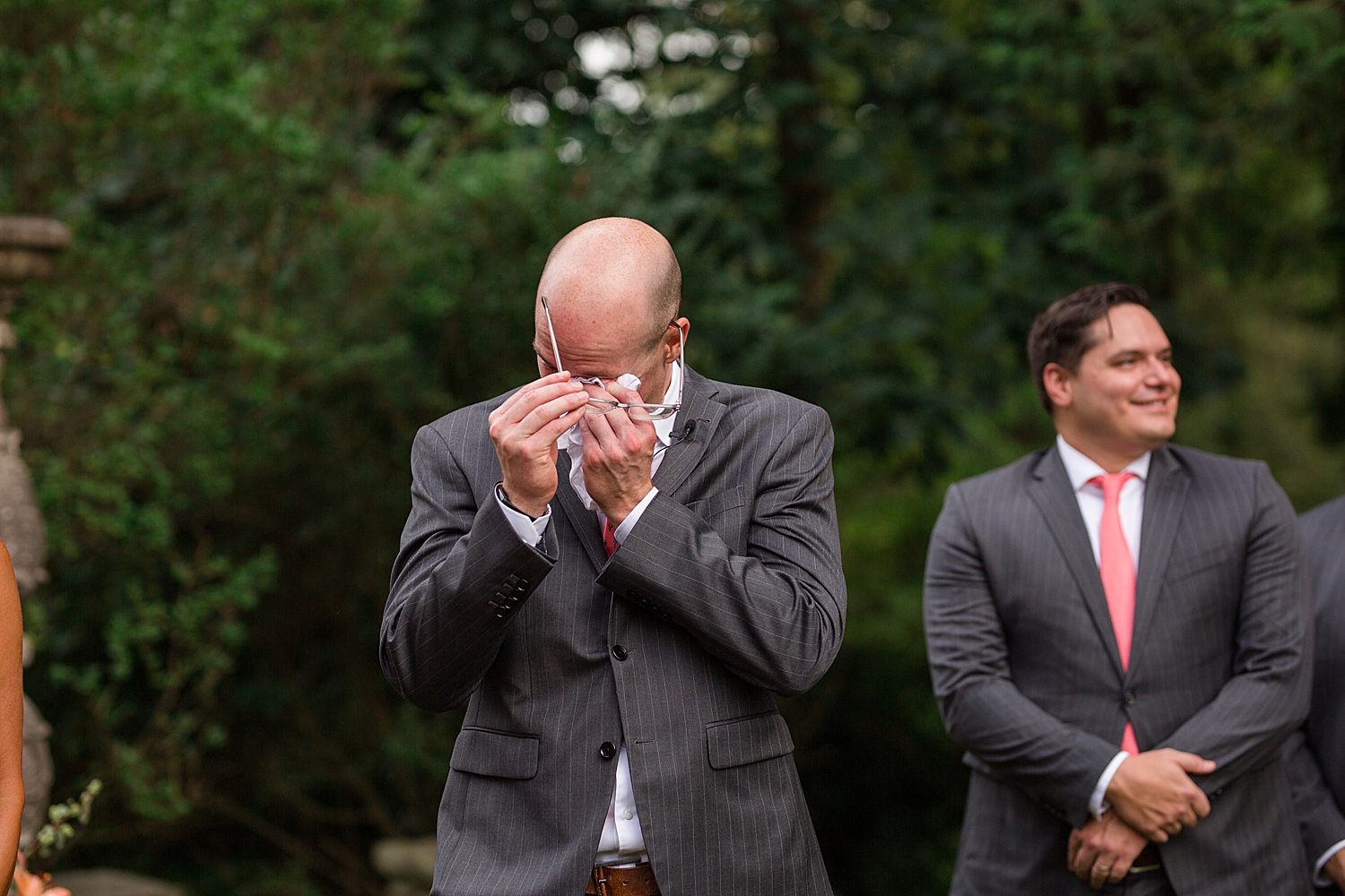 groom crying at ceremony