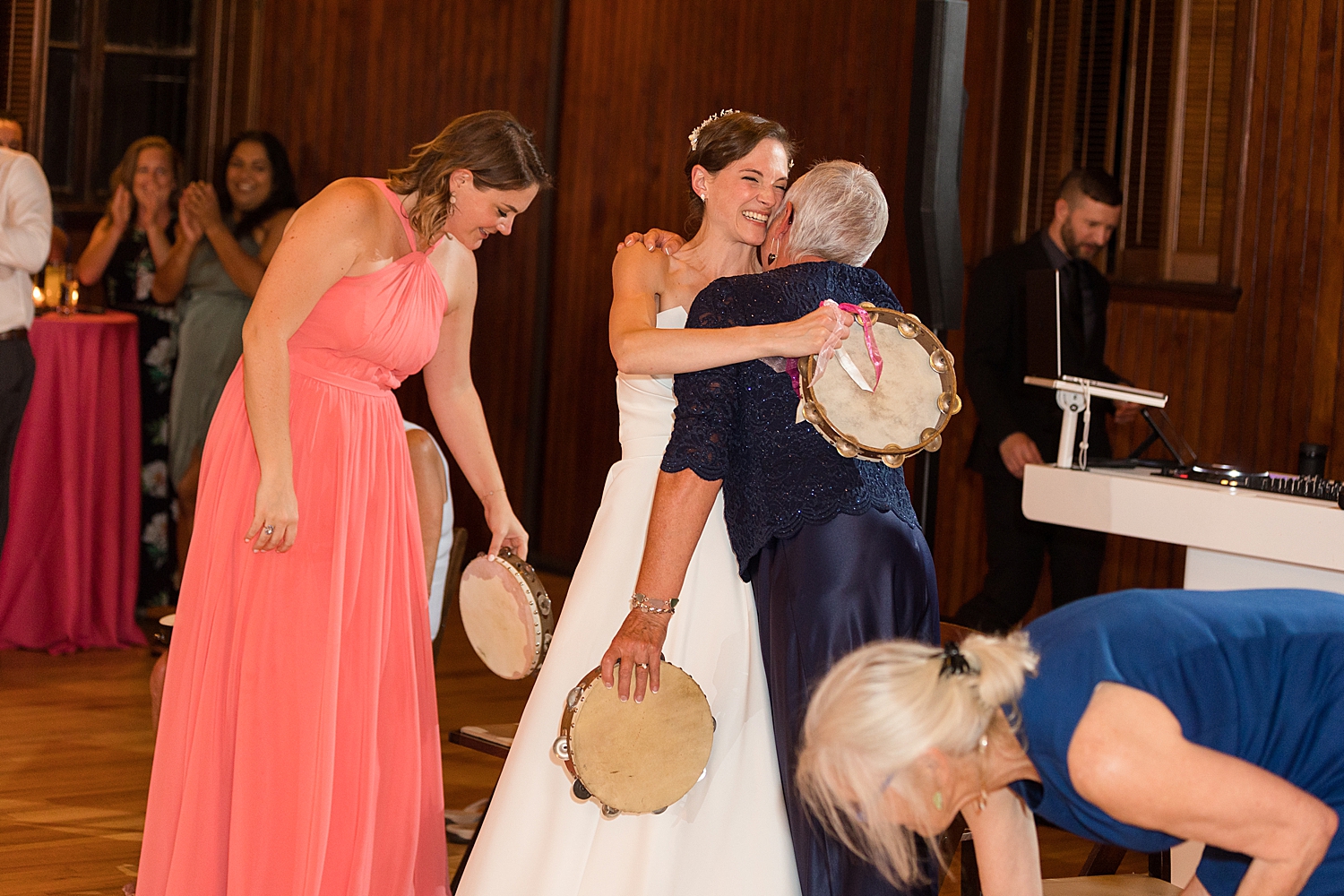 synchronized tambourine circle tradition family hug