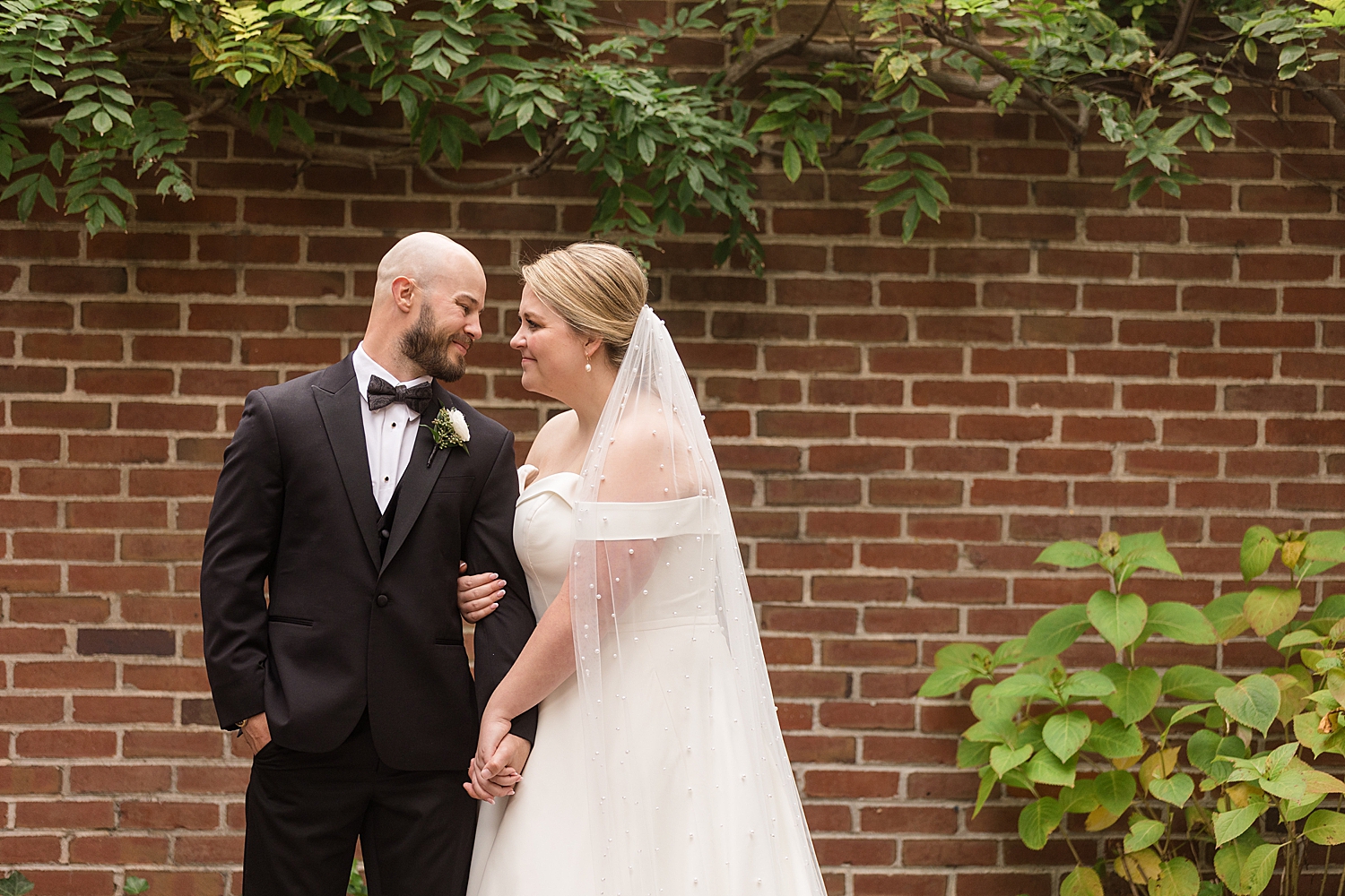 couple portrait, smile at each other