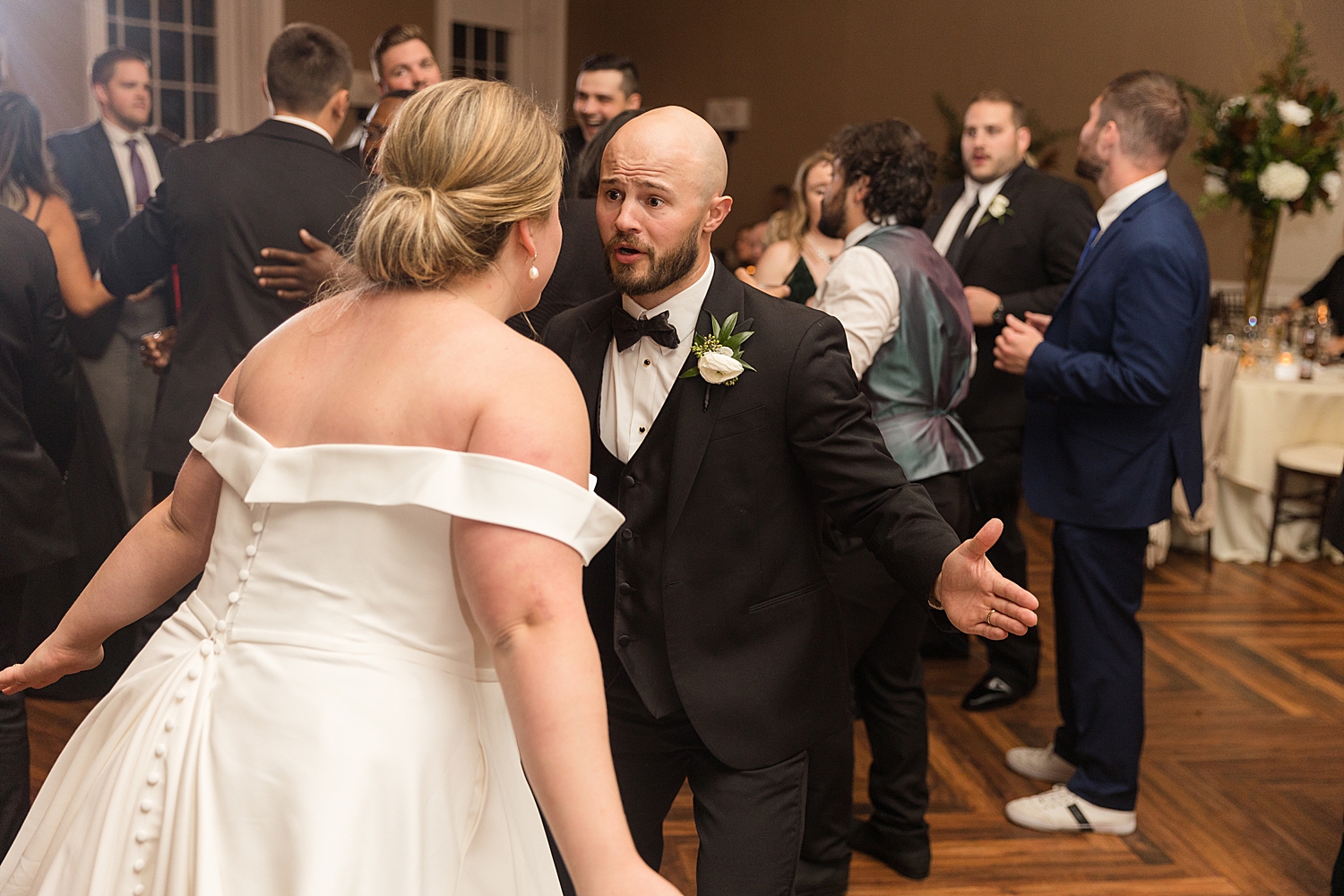 bride and groom dancing at reception