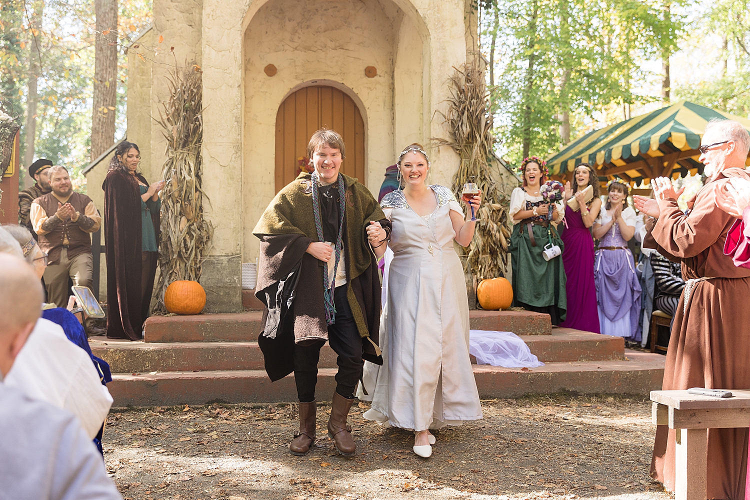 bride and groom recess after maryland renaissance festival ceremony