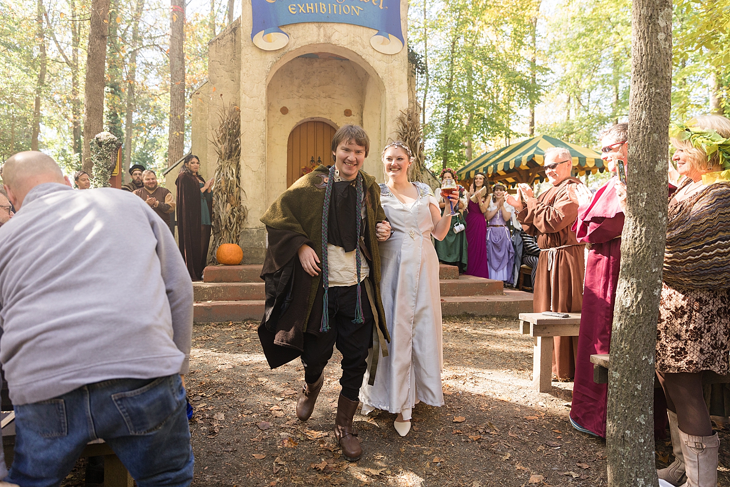 bride and groom recess after maryland renaissance festival ceremony