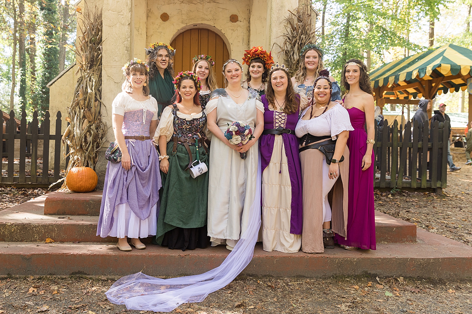 bride and bridesmaids dressed for bride and groom recess after maryland renaissance festival ceremony