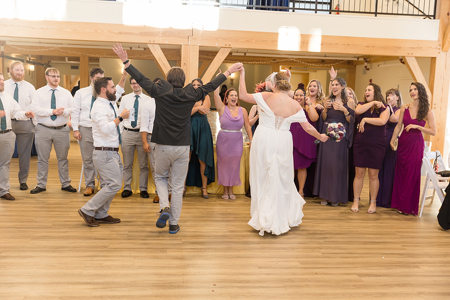 bride and groom enter reception