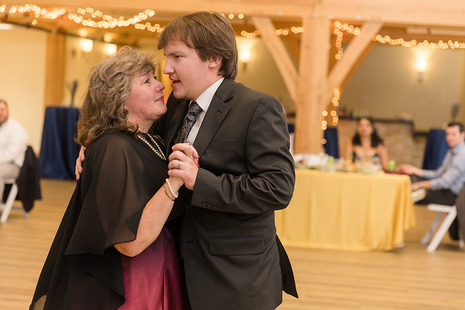 groom dances with mom