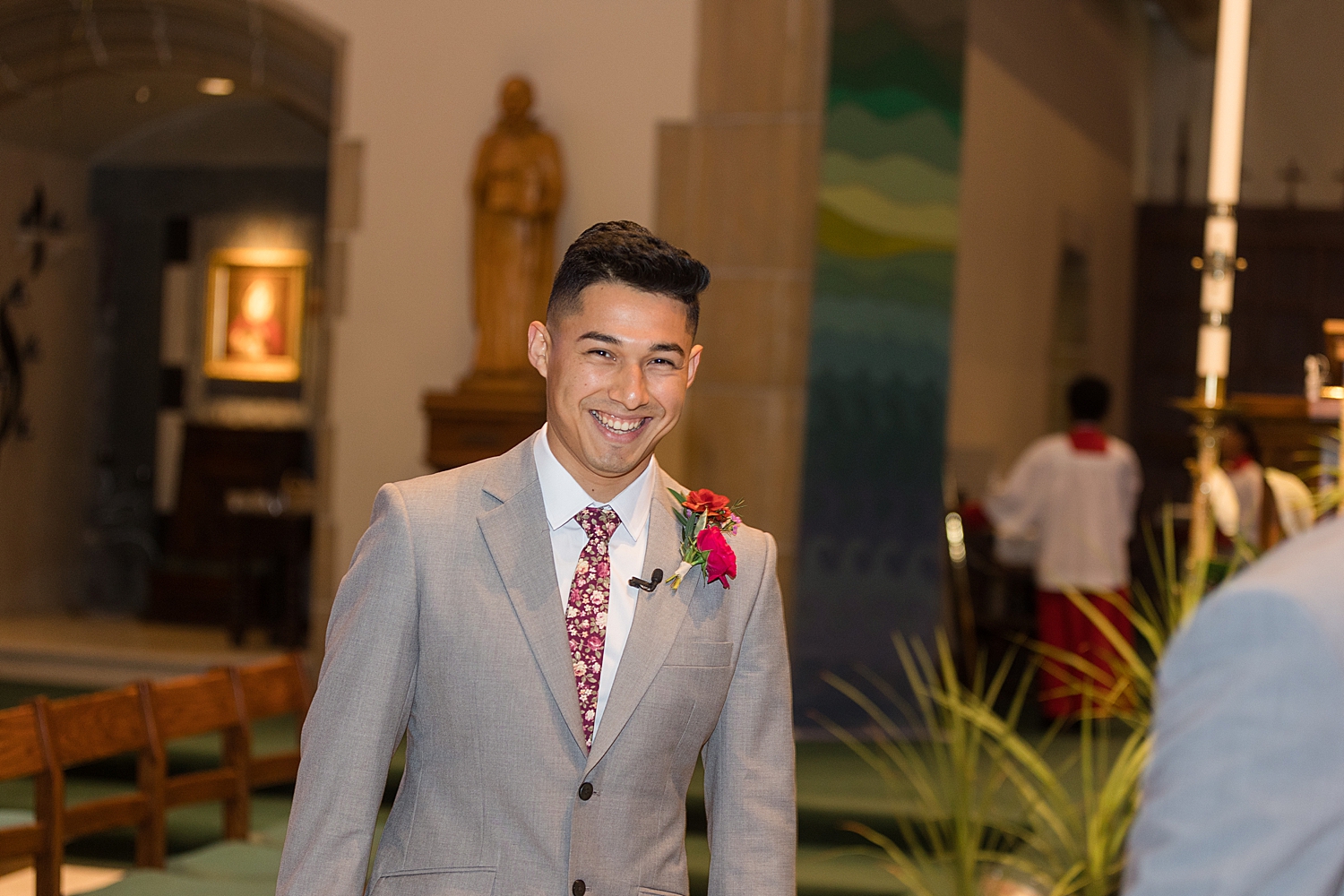 groom entering ceremony at loyola chapel