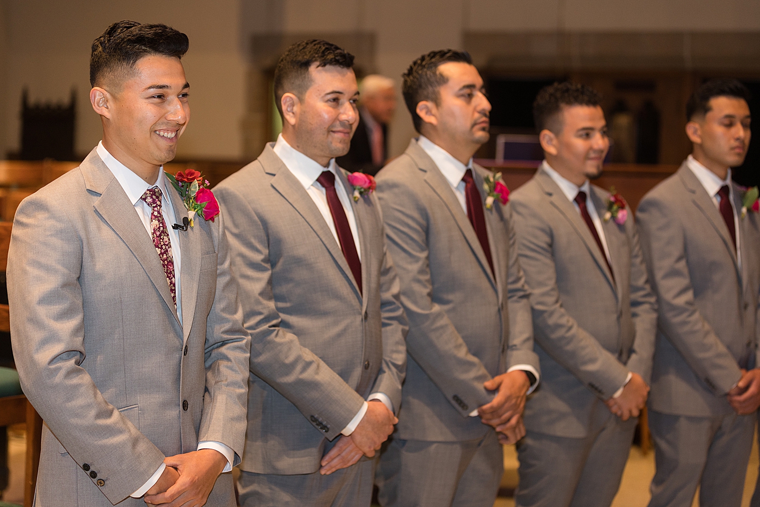 groom waits for bride during the ceremony