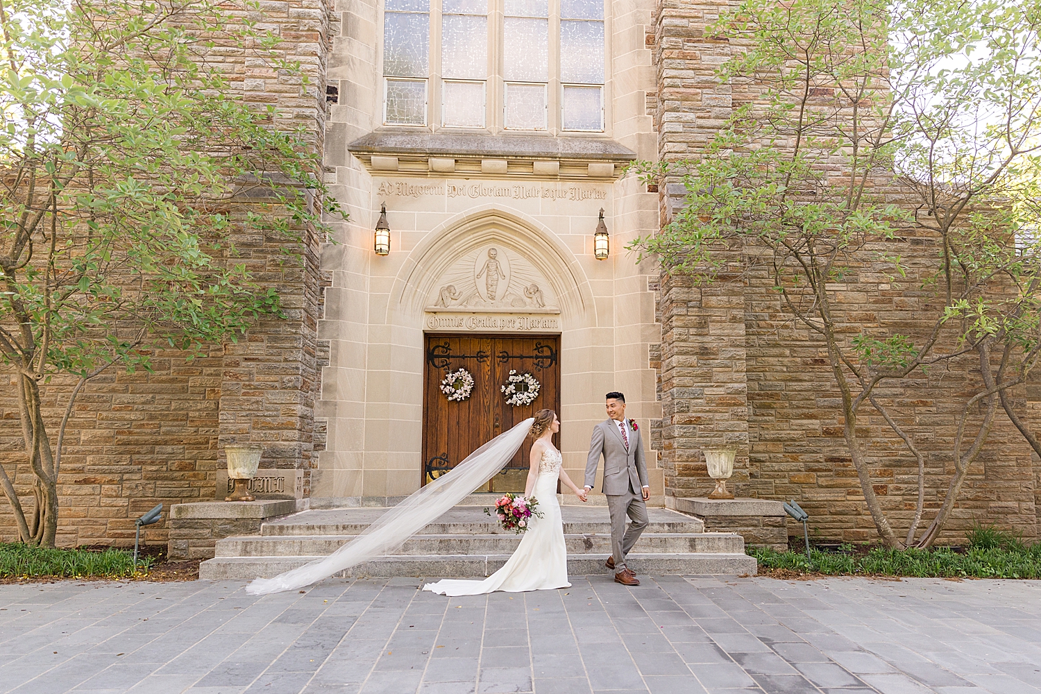 bride and groom walk across chapel