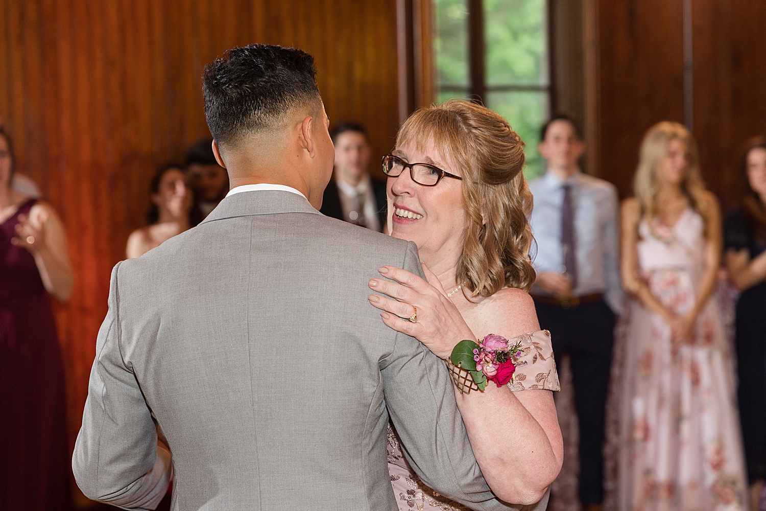 groom dances with mom