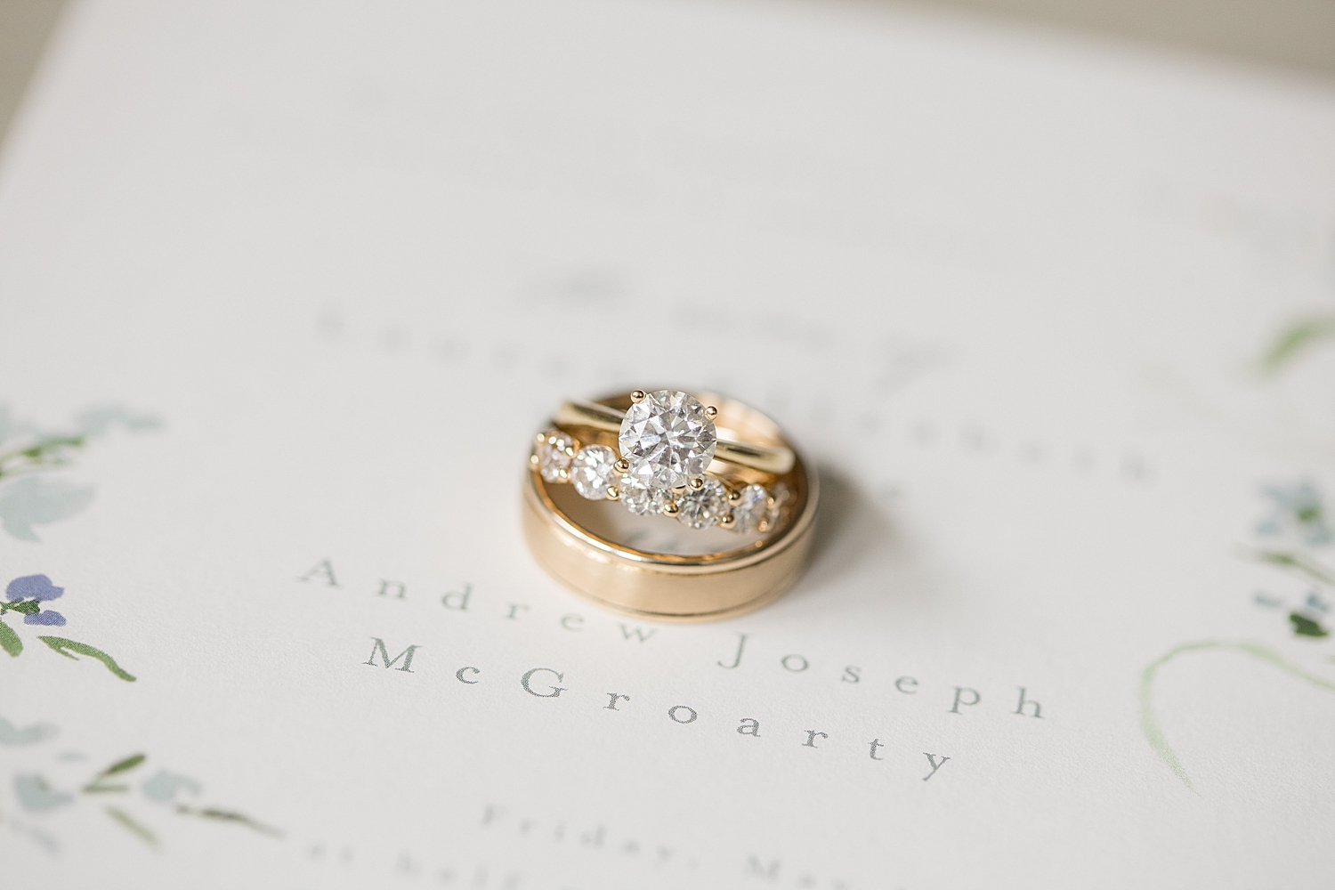 wedding rings on wedding invitation